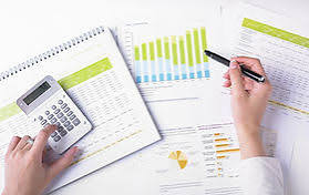 Notebook, calculator, charts, and notes used for planning and learning